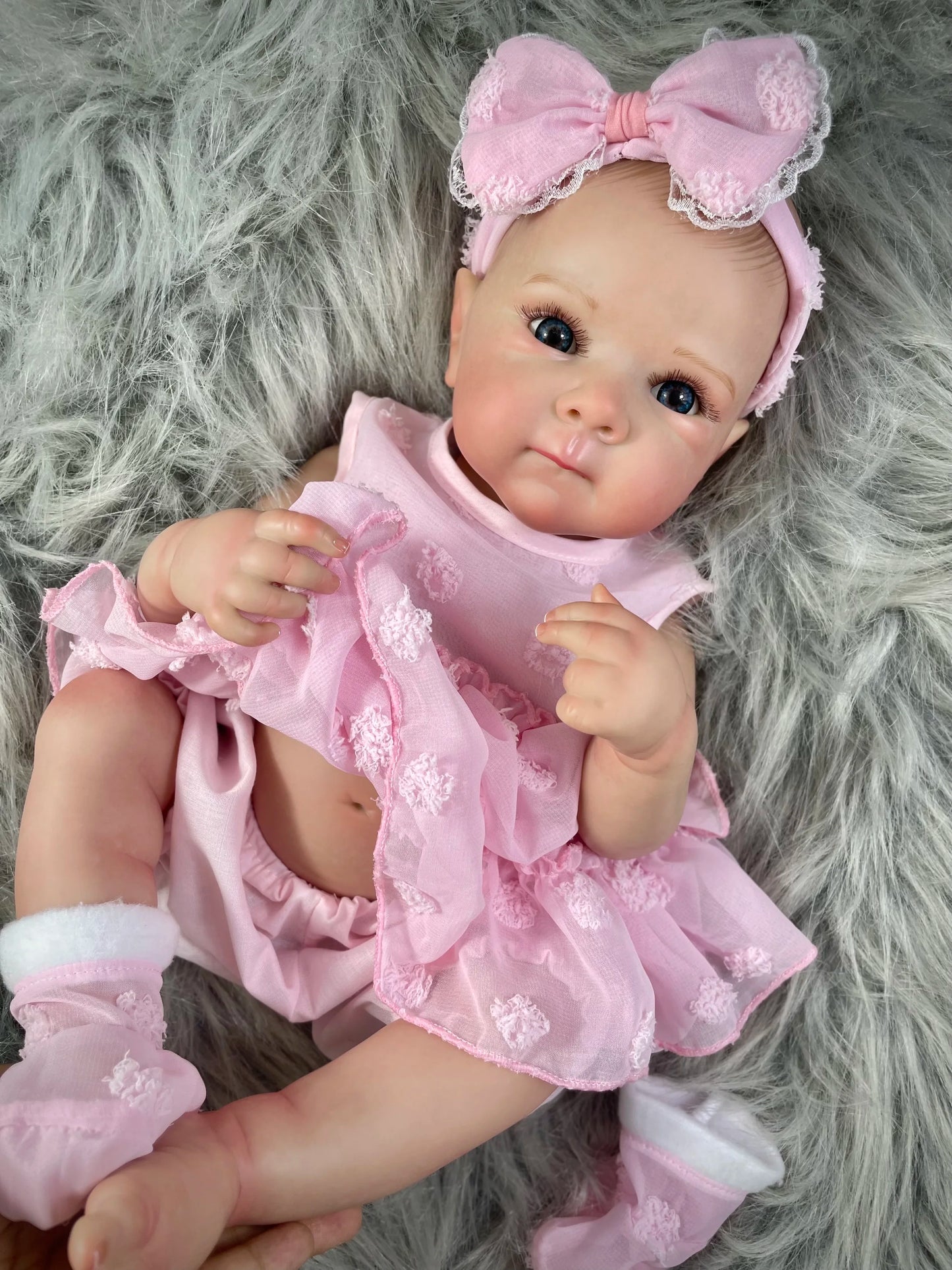 Reborn baby doll accessories including pacifier, bottle and birth certificate