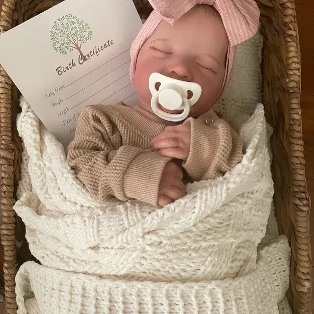 Collectible 43cm sleeping reborn baby doll with lifelike details