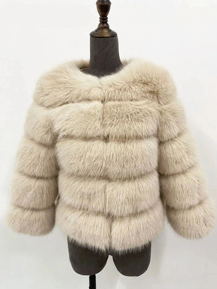 A sophisticated faux fur coat in an elegant design, suitable for autumn and winter. The coat features a plush texture resembling real fur, offering warmth and comfort. Available in sizes S to 5XL, it ensures a flattering fit for various body types.