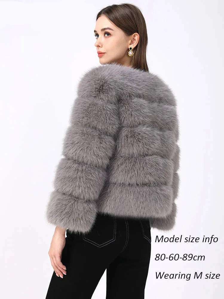 A sophisticated faux fur coat in an elegant design, suitable for autumn and winter. The coat features a plush texture resembling real fur, offering warmth and comfort. Available in sizes S to 5XL, it ensures a flattering fit for various body types.