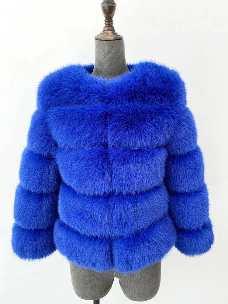 A vibrant faux fur coat with a burst of colours, perfect for autumn and winter. This coat showcases a plush, thick texture that mimics real fur, providing warmth and a stylish appearance. Available in sizes S to 5XL, it offers a flattering fit for different body shapes.