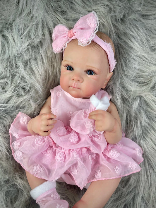 Lifelike 48cm vinyl reborn baby doll girl with painted hair and blue eyes