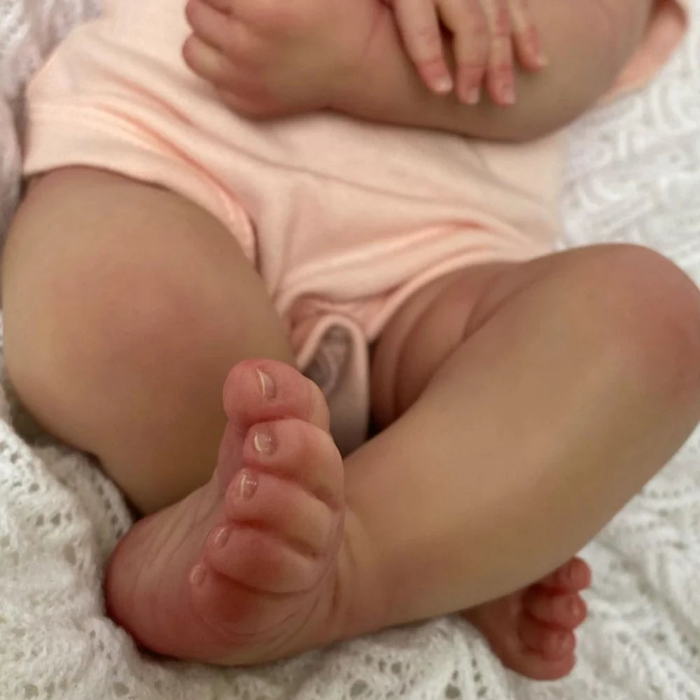 Cloth body reborn doll with pacifier and feeding bottle