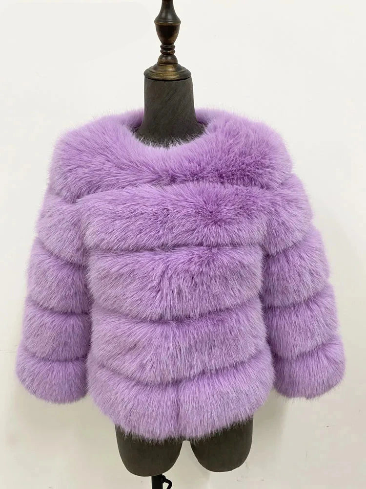 A vibrant faux fur coat with a burst of colours, perfect for autumn and winter. This coat showcases a plush, thick texture that mimics real fur, providing warmth and a stylish appearance. Available in sizes S to 5XL, it offers a flattering fit for different body shapes.