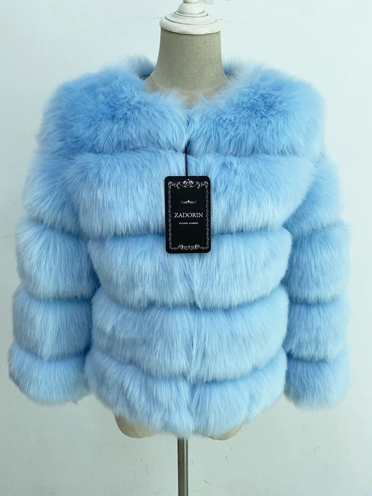 A vibrant faux fur coat with a burst of colours, perfect for autumn and winter. This coat showcases a plush, thick texture that mimics real fur, providing warmth and a stylish appearance. Available in sizes S to 5XL, it offers a flattering fit for different body shapes.