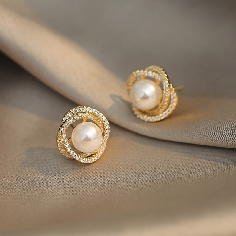 Gold Earrings Swirl-Shaped with Pearls and Zircons