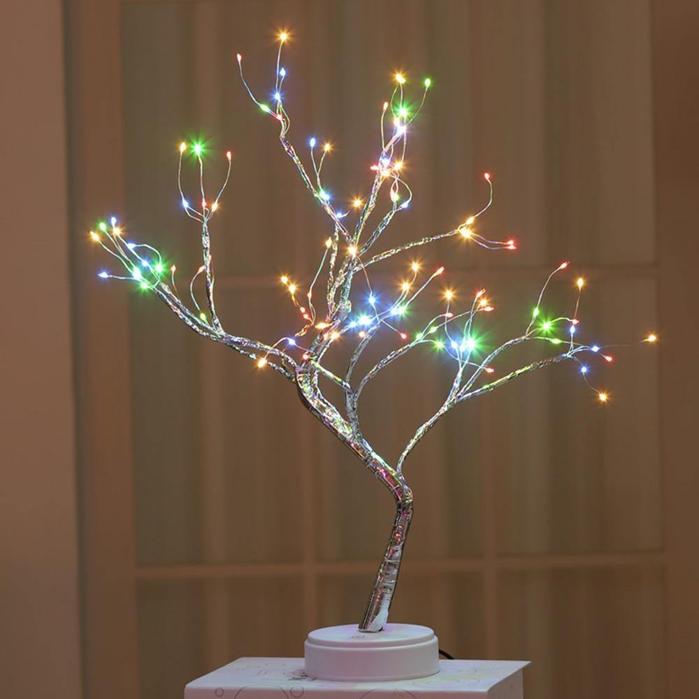 Beautifully crafted tree in the image of a delicate bonsai tree, decorated with cherry blossoms and covered in wonderful warm lights. It has malleable branches so you can model your tree the way you want!