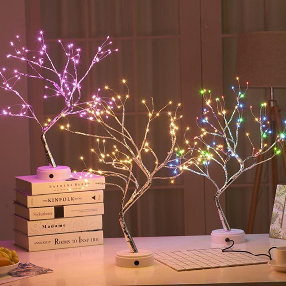 Beautifully crafted tree in the image of a delicate bonsai tree, decorated with cherry blossoms and covered in wonderful warm lights. It has malleable branches so you can model your tree the way you want!