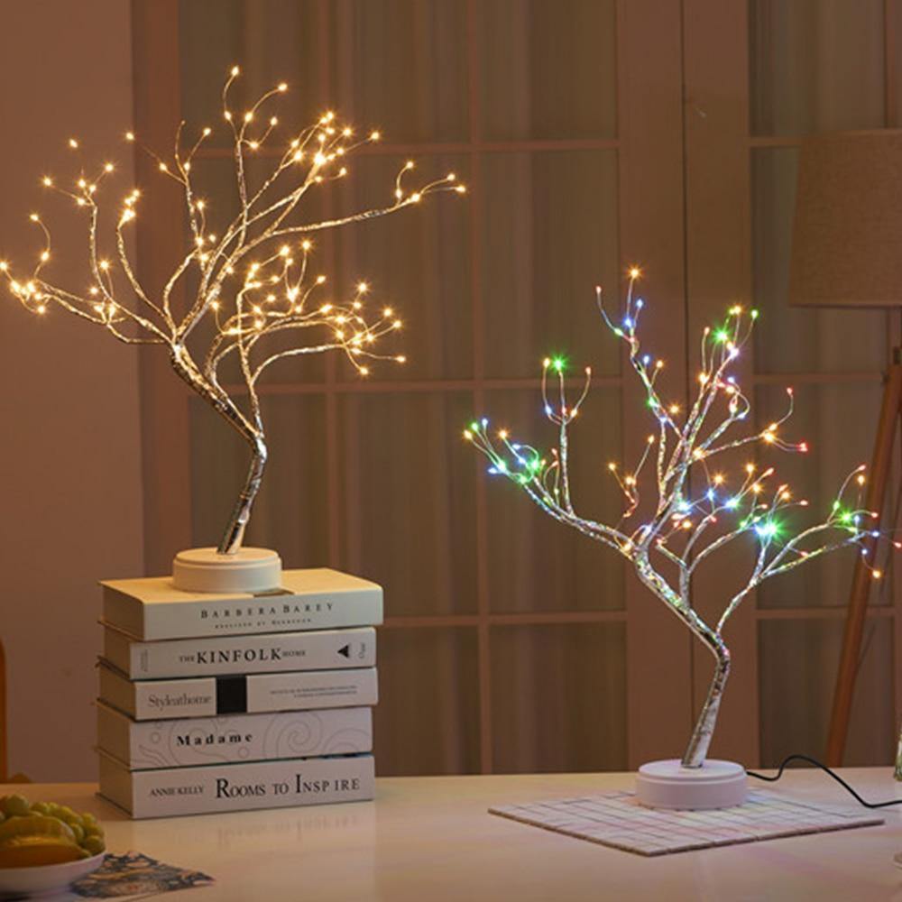 Beautifully crafted tree in the image of a delicate bonsai tree, decorated with cherry blossoms and covered in wonderful warm lights. It has malleable branches so you can model your tree the way you want!